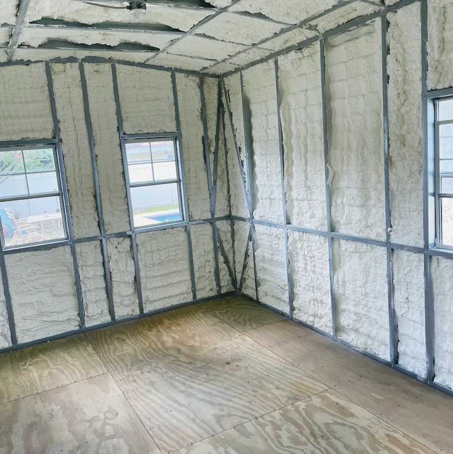 Closed-cell spray foam insulation applied to wall cavities in a residential project in Winthrop Harbor